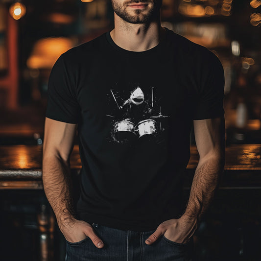 A person wearing a black t-shirt with a graphic print of a shark drummer.