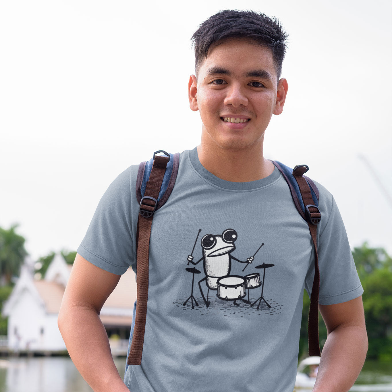 Guy wearing frog drummer print t-shirt