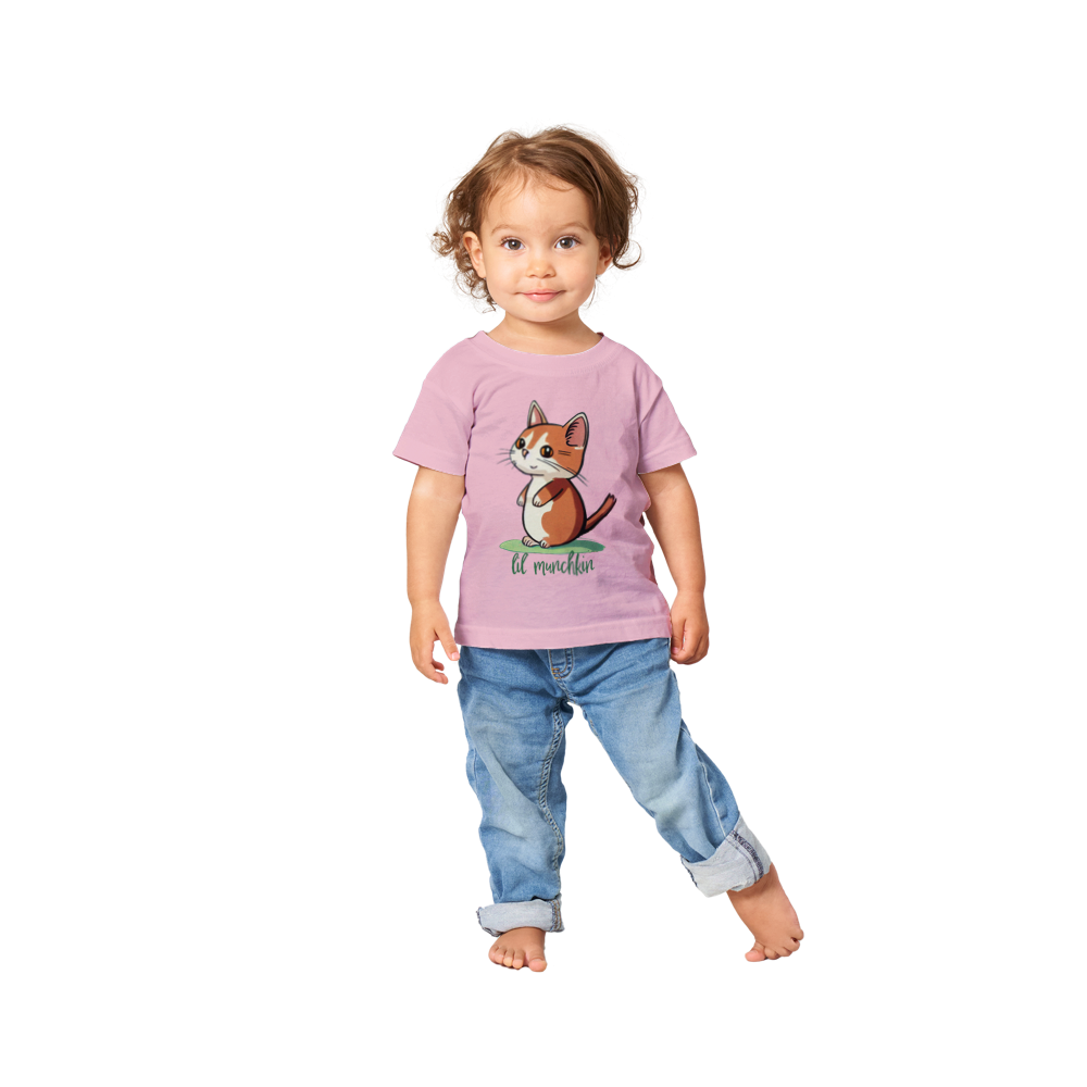 a baby wearing a pink t-shirt with a lil munchkin kitten print