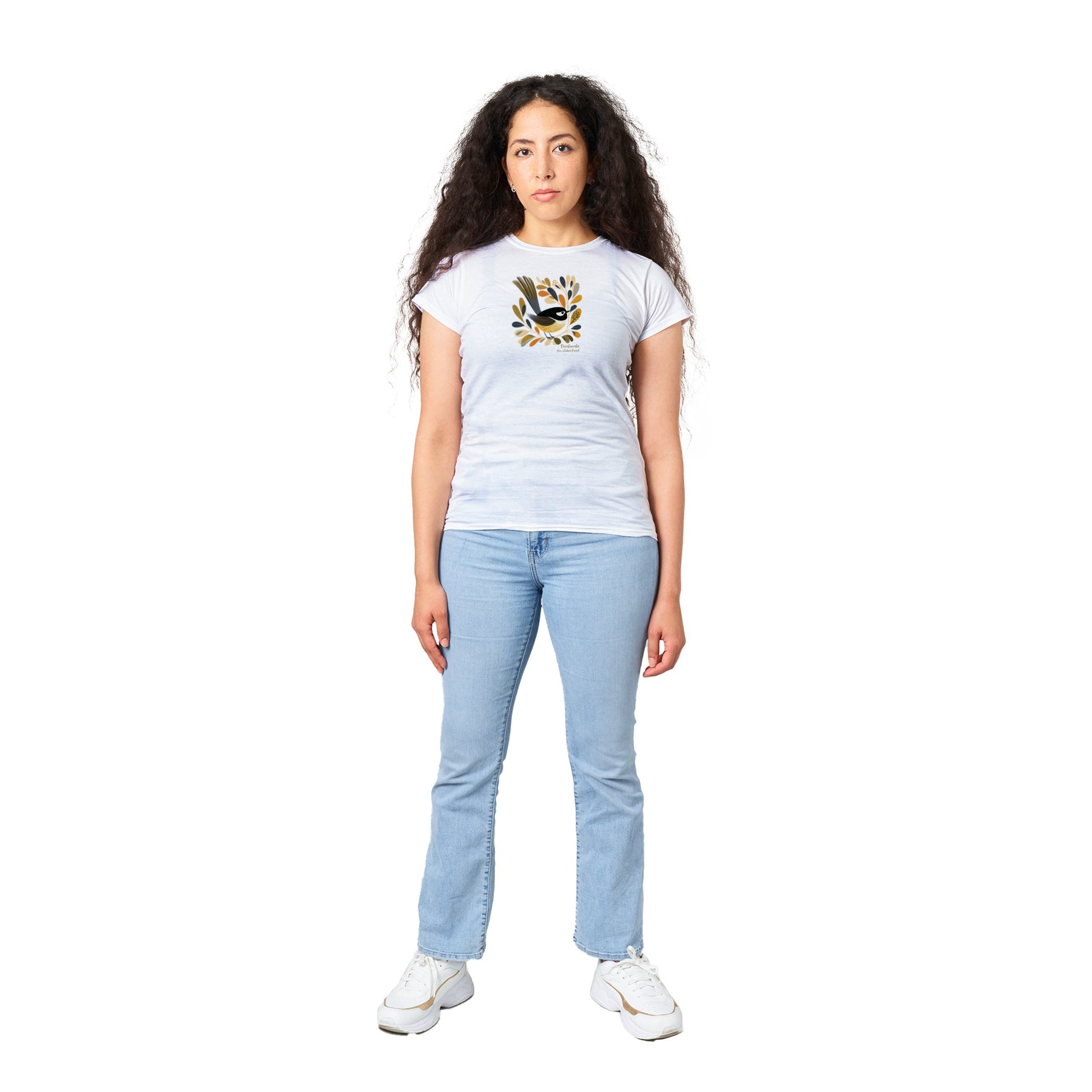 woman wearing a white t-shirt with a Pīwakawaka Fantail Print on the front