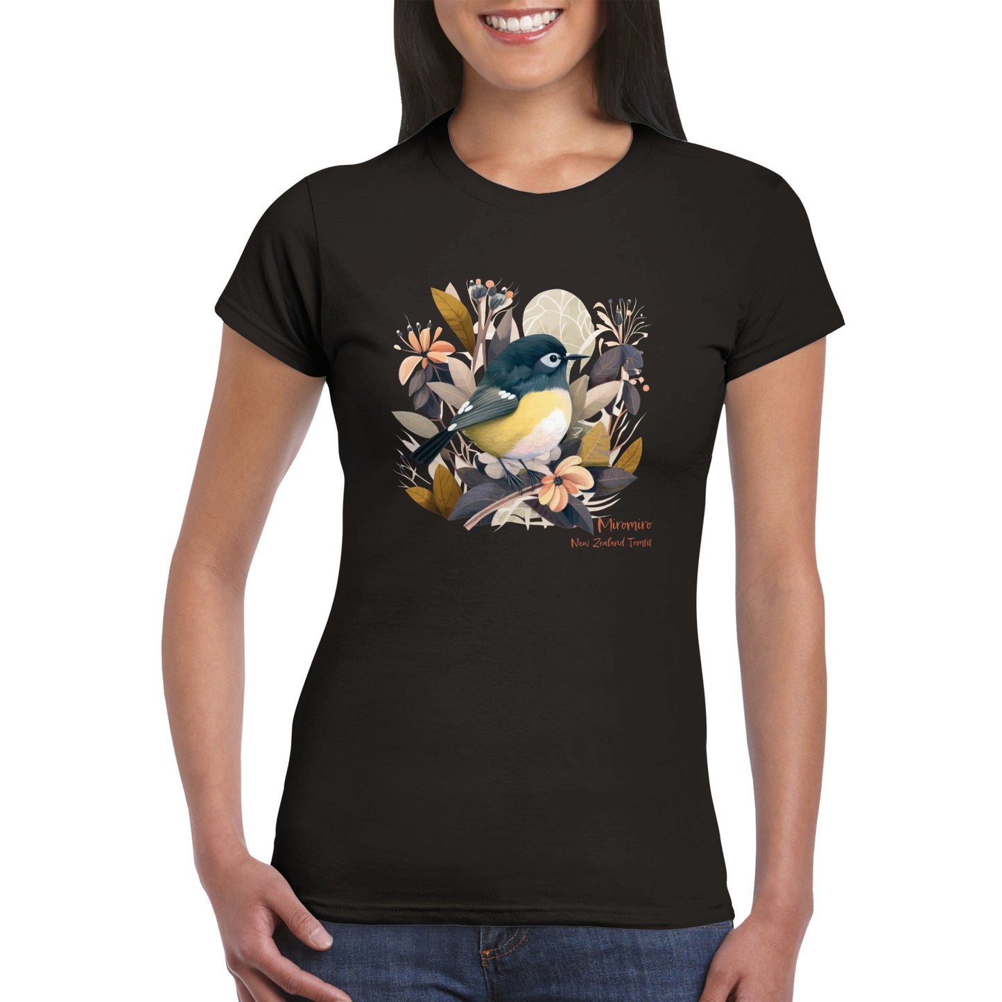 woman wearing a black t-shirt with a New Zealand Miromiro tomtit bird print