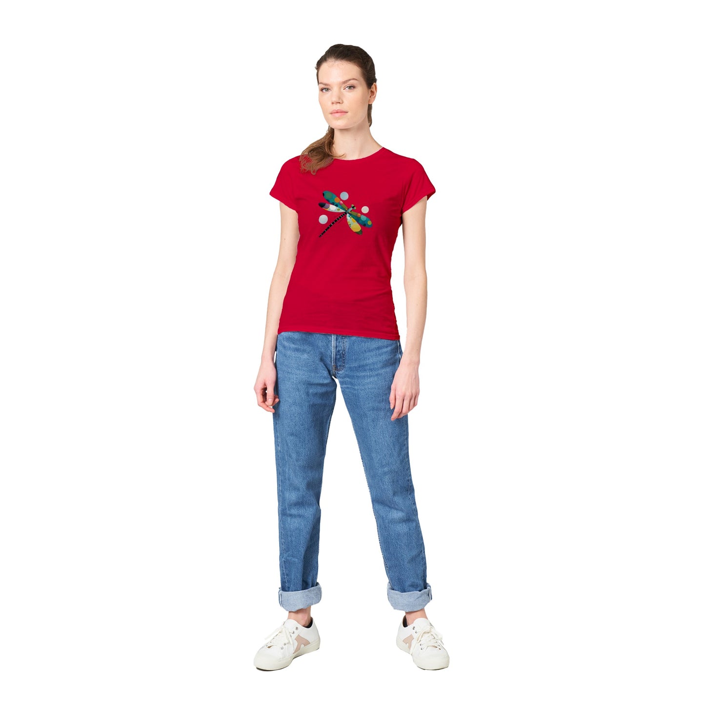 Woman wearing a red t-shirt with an abstract colourful dragonfly print
