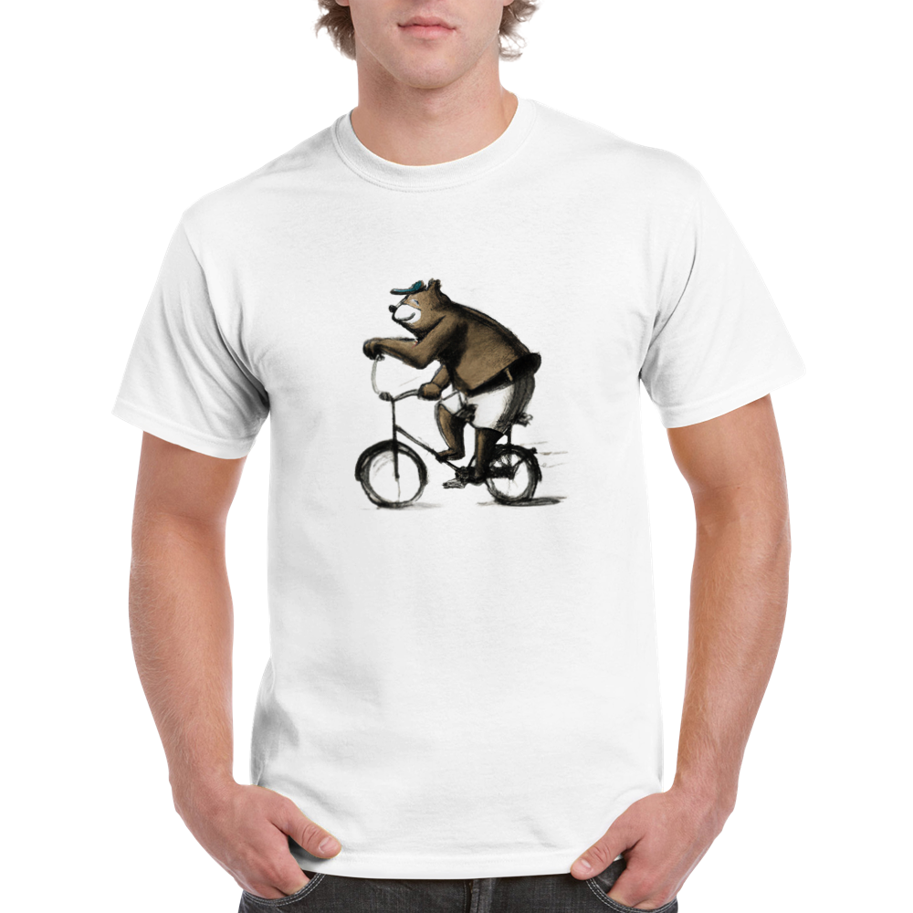 Man wearinga white t-shirt with a bear in shorts and cap riding a bike