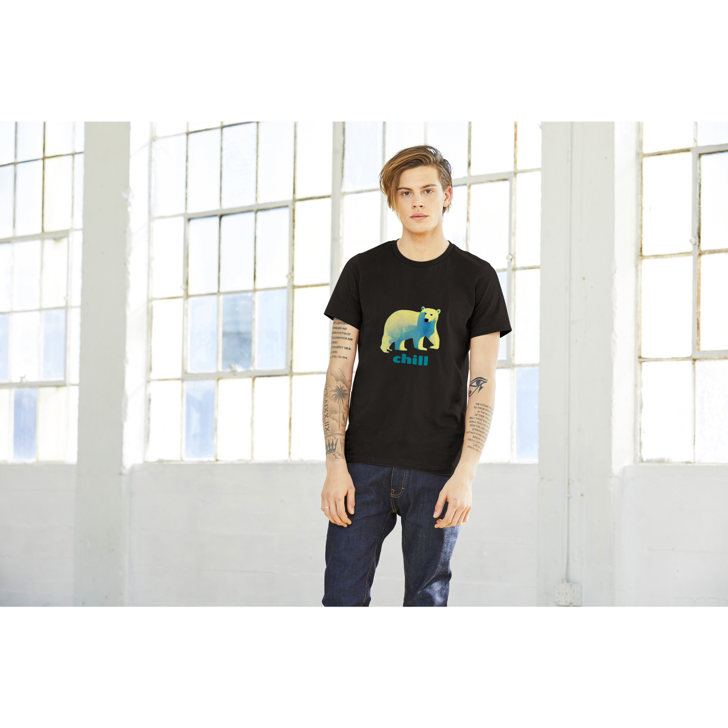 Guy wearing a black t-shirt with a polar bear print with chill caption