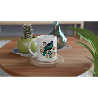 Ceramic coffee mug with New Zealand Tūī bird design