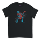 Black unisex T-shirt featuring a colourful cartoon robot rocking out on an electric guitar with a dynamic splatter effect behind it.