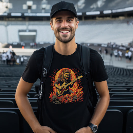 guy in a stadium wearing a black t-shirt with a lion playing guitar print