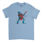 Light blue unisex T-shirt featuring a colourful cartoon robot rocking out on an electric guitar with a dynamic splatter effect behind it.