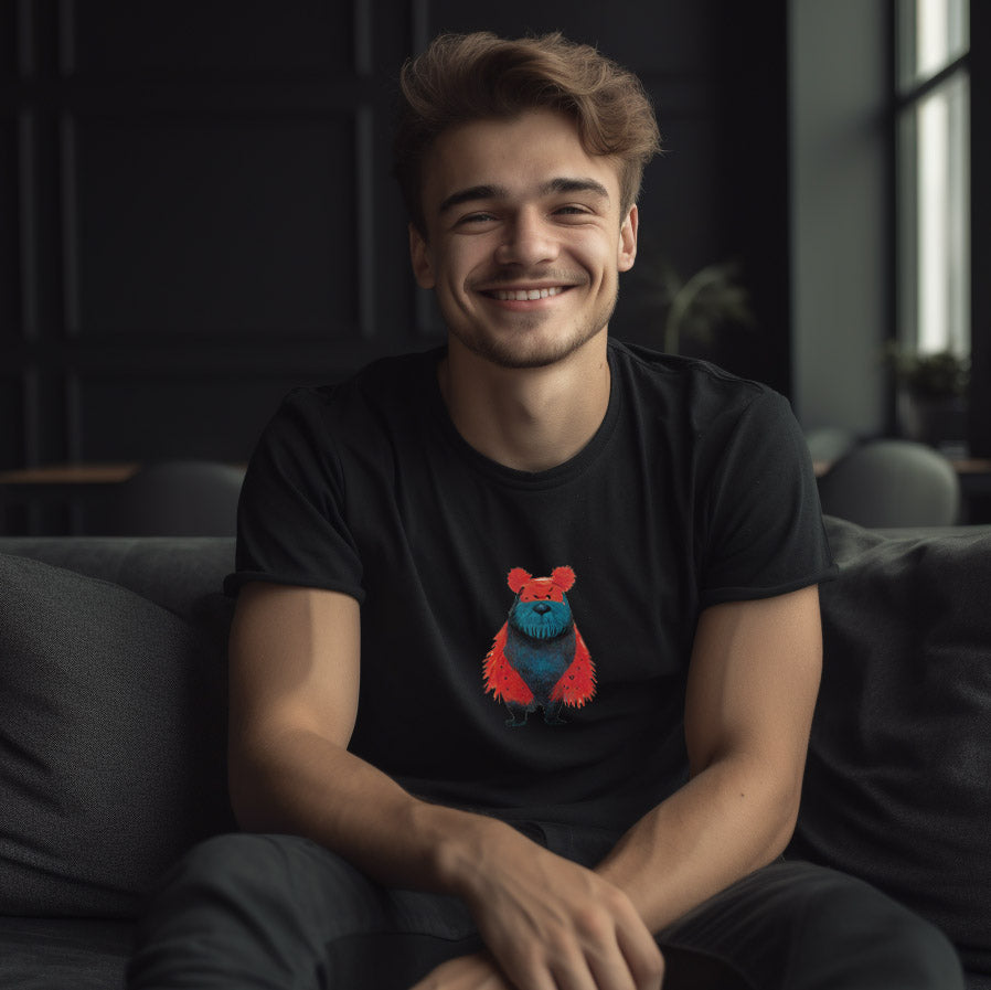 guy sitting on couch wearing a black t-shirt with a cute cartoon bear print