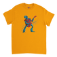 Gold unisex T-shirt featuring a colourful cartoon robot rocking out on an electric guitar with a dynamic splatter effect behind it.