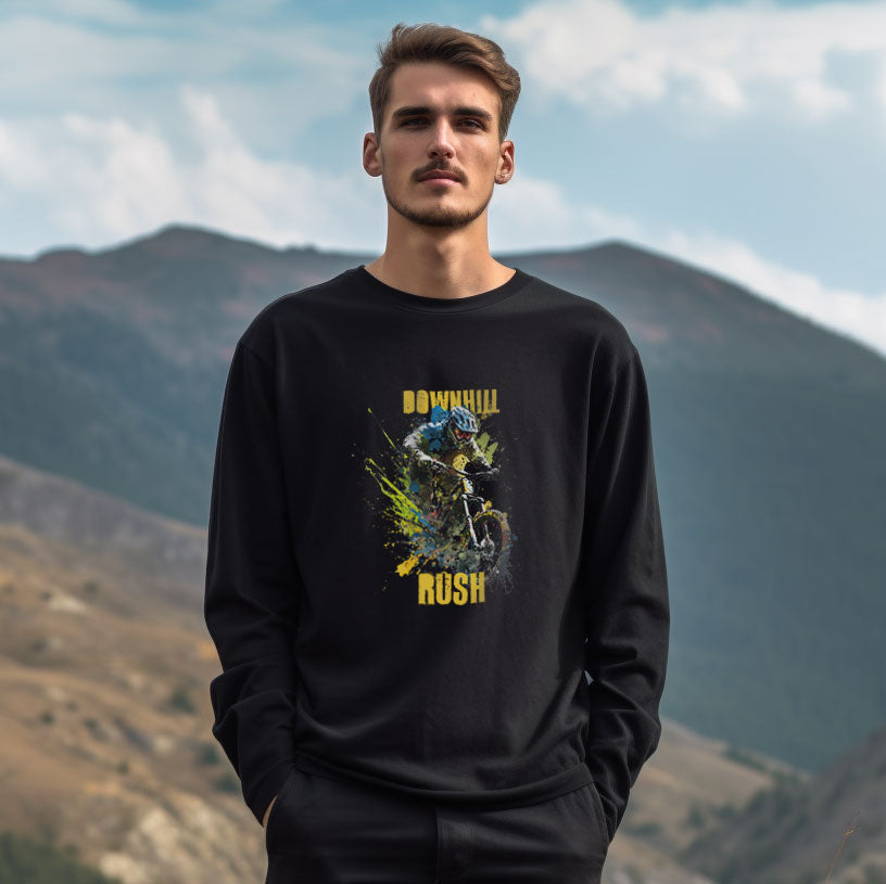 guy in the mountains wearing a black long sleeve t-shirt with Downhill Rush Mountain bike graphic