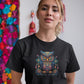 woman wearing a black t-shirt with a colorful floral owl print