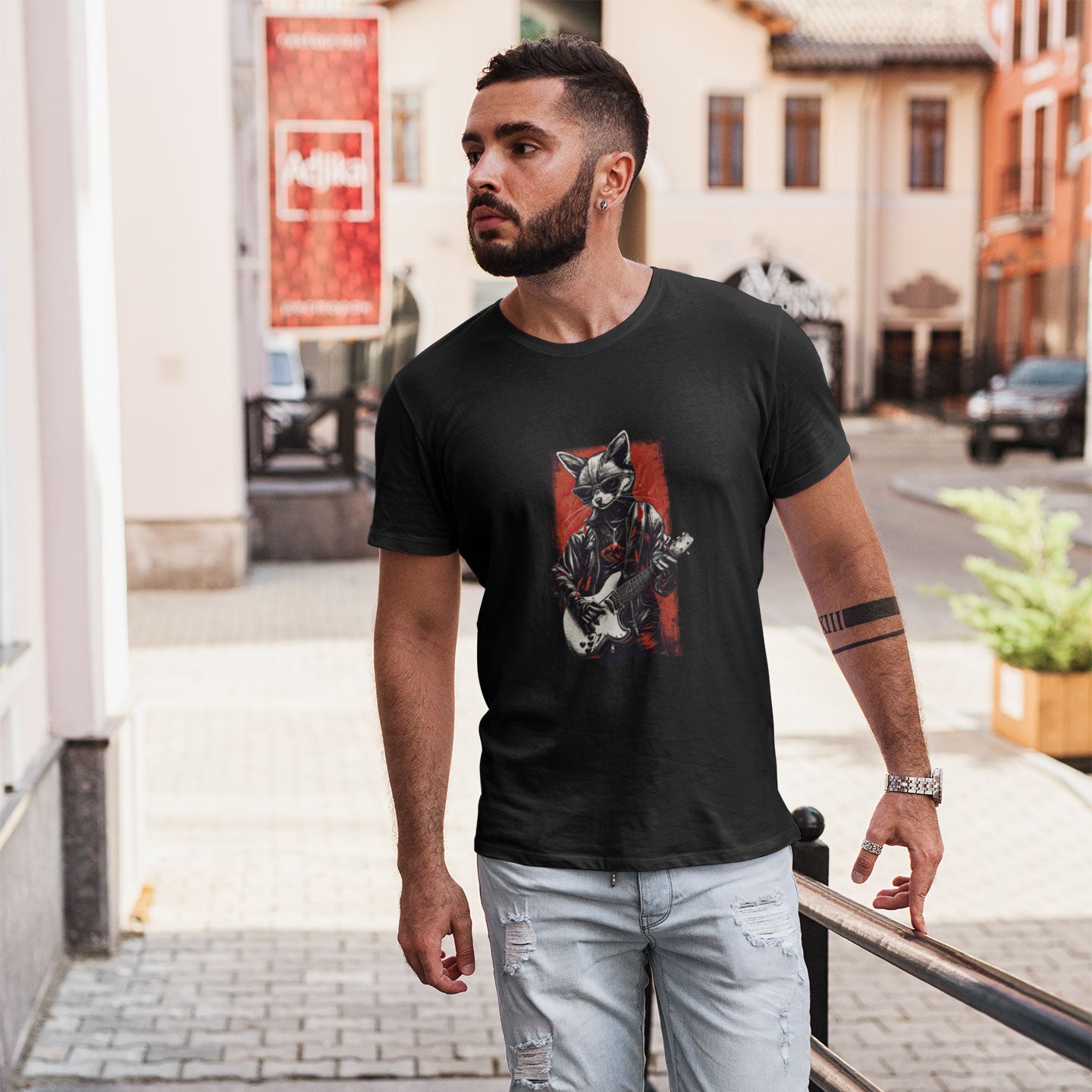guy wearing a black t-shirt with a cool fox playing bass guitar print