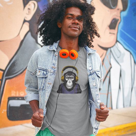 A guy wearing a denim jacket and a t-shirt with a chimp wearing headphones listening to music print