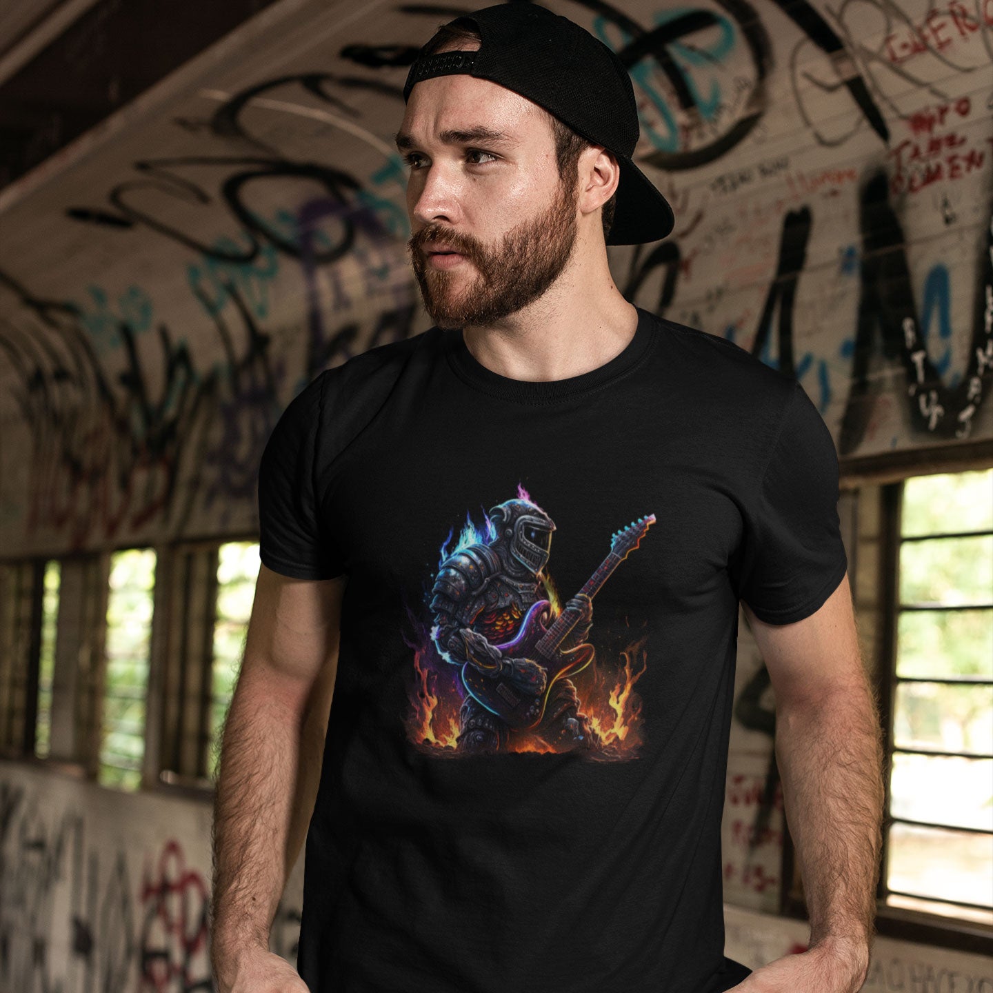Guy wearing black t-shirt with Space Robot on fire playing the guitar