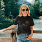 woman wearing a black t-shirt with gold tigers print