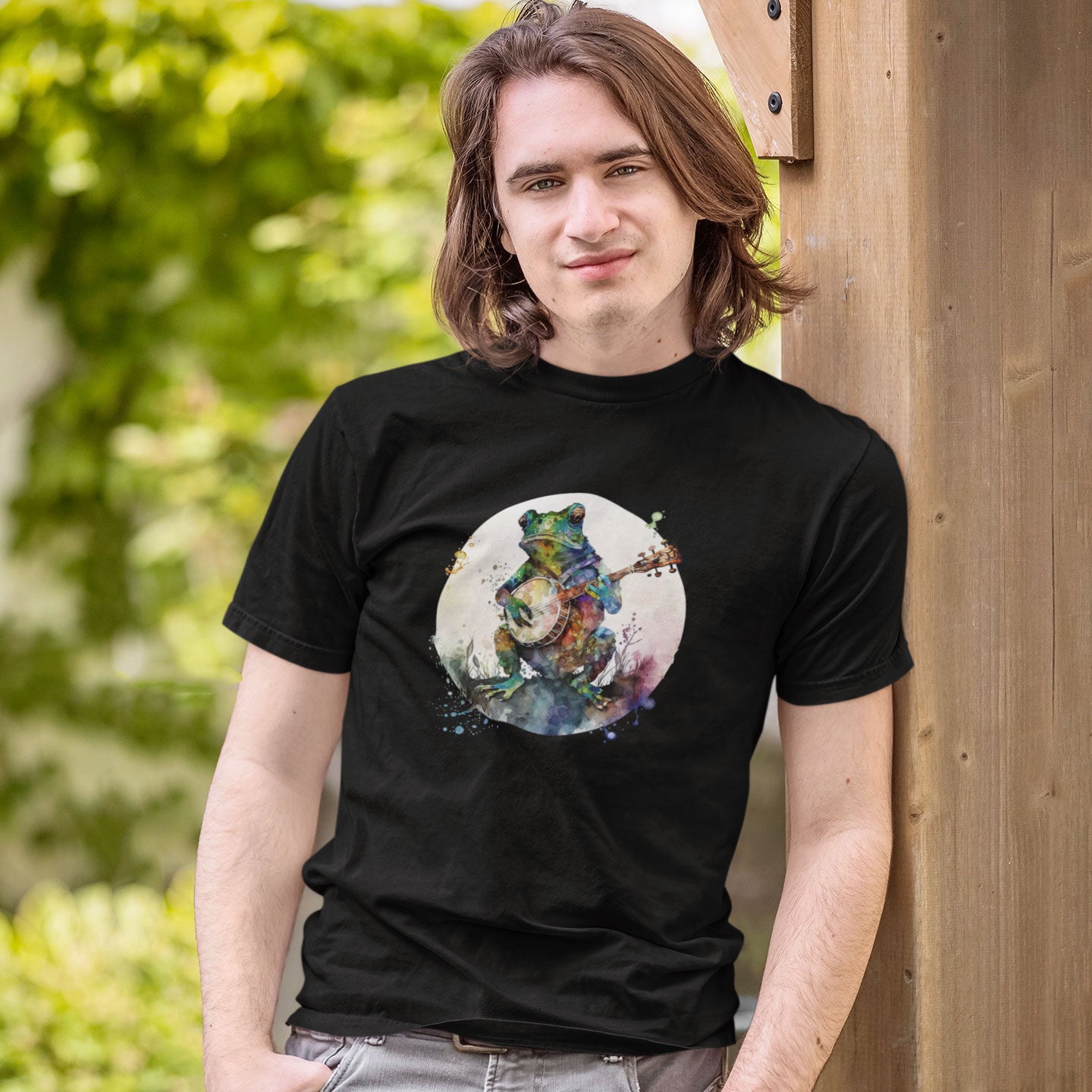 Guy wearing a black t-shirt with a frog playing a banjo print