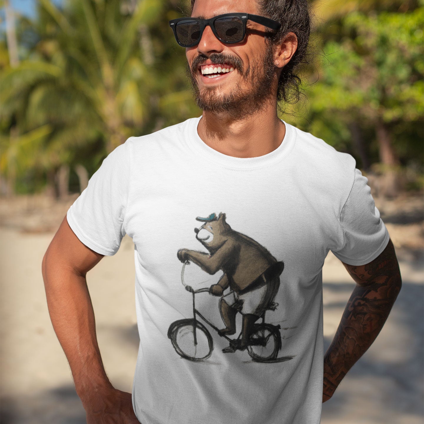 Man wearinga white t-shirt with a bear in shorts and cap  riding a bike