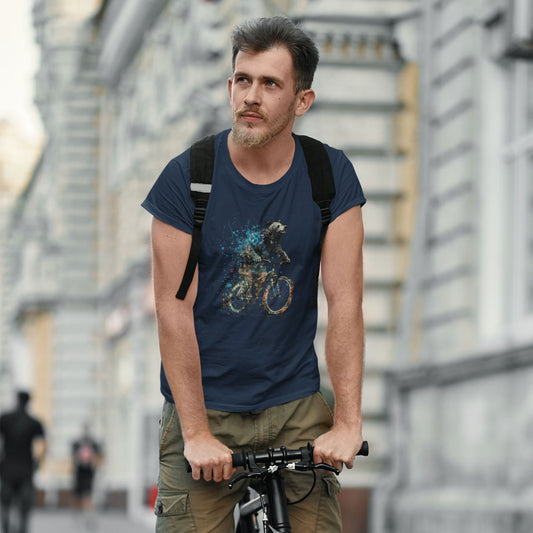 Guy riding a bike wearing a navy blue t-shirt with a happy bear riding a bike print