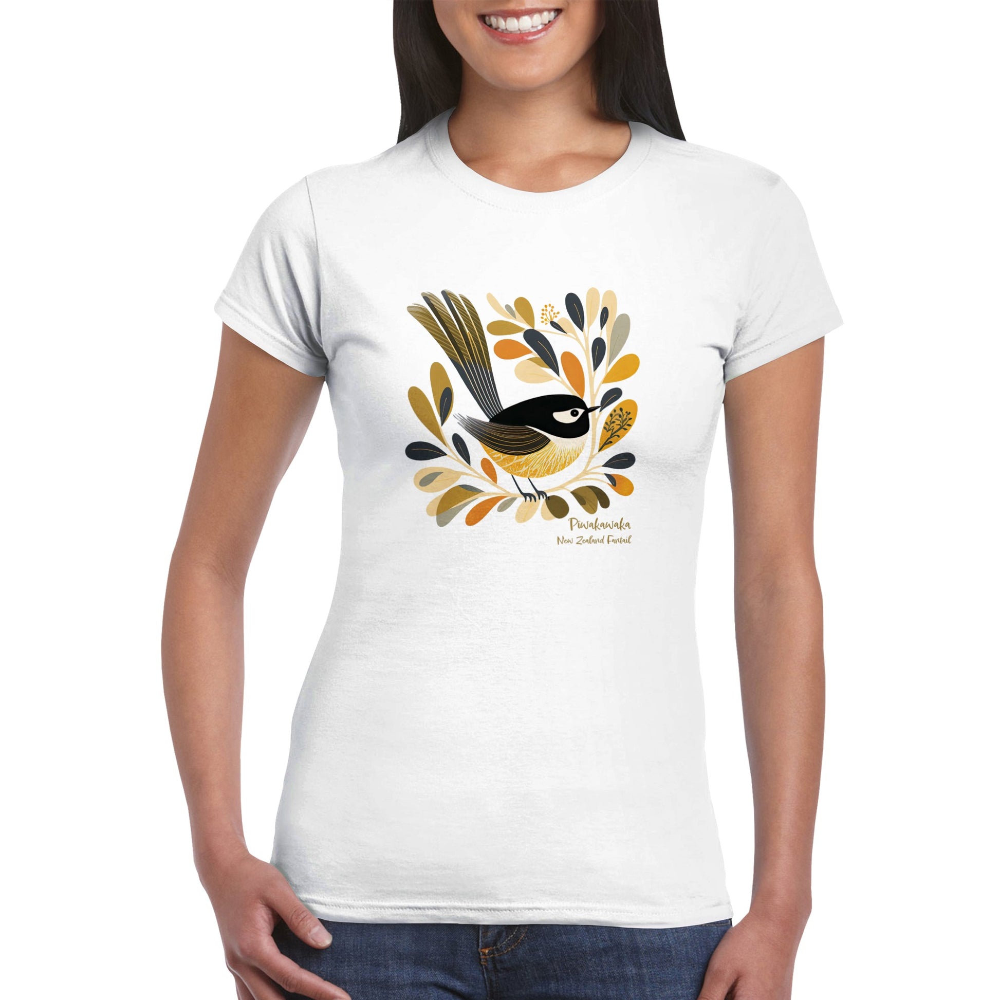 woman wearing a white t-shirt with a Pīwakawaka Fantail Print on the front