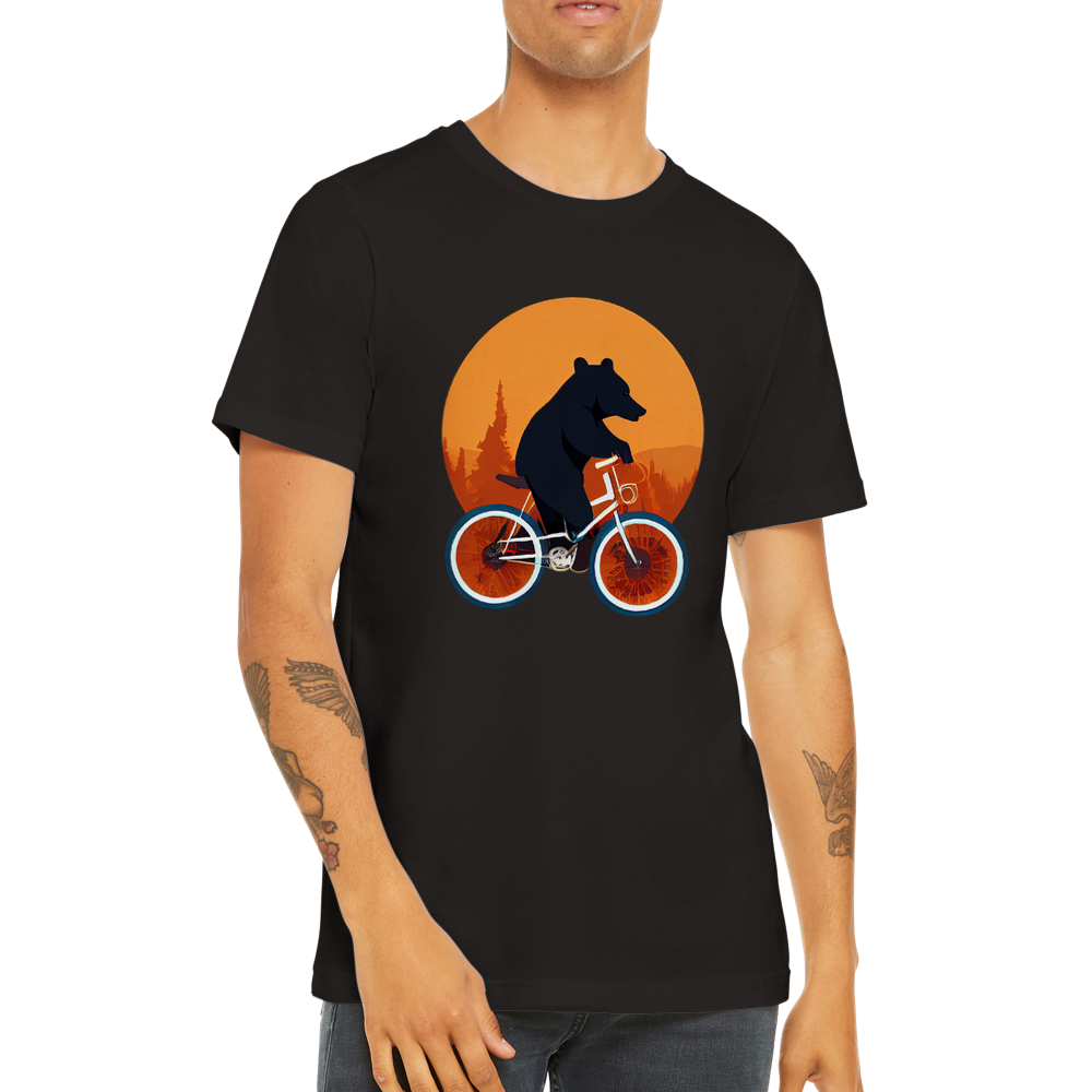 A guy  wearing a black t-shirt with a bear riding a bike print