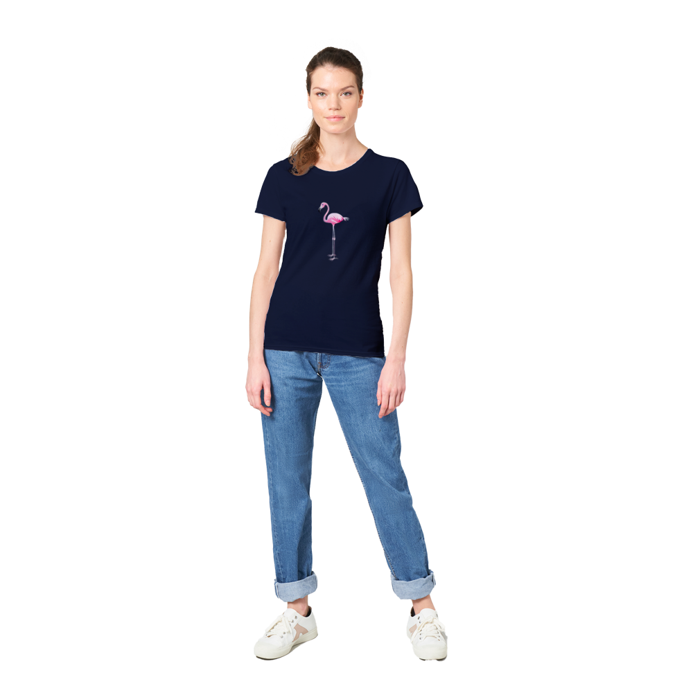 a woman wearing a navy blue t-shirt with a pink flamingo print