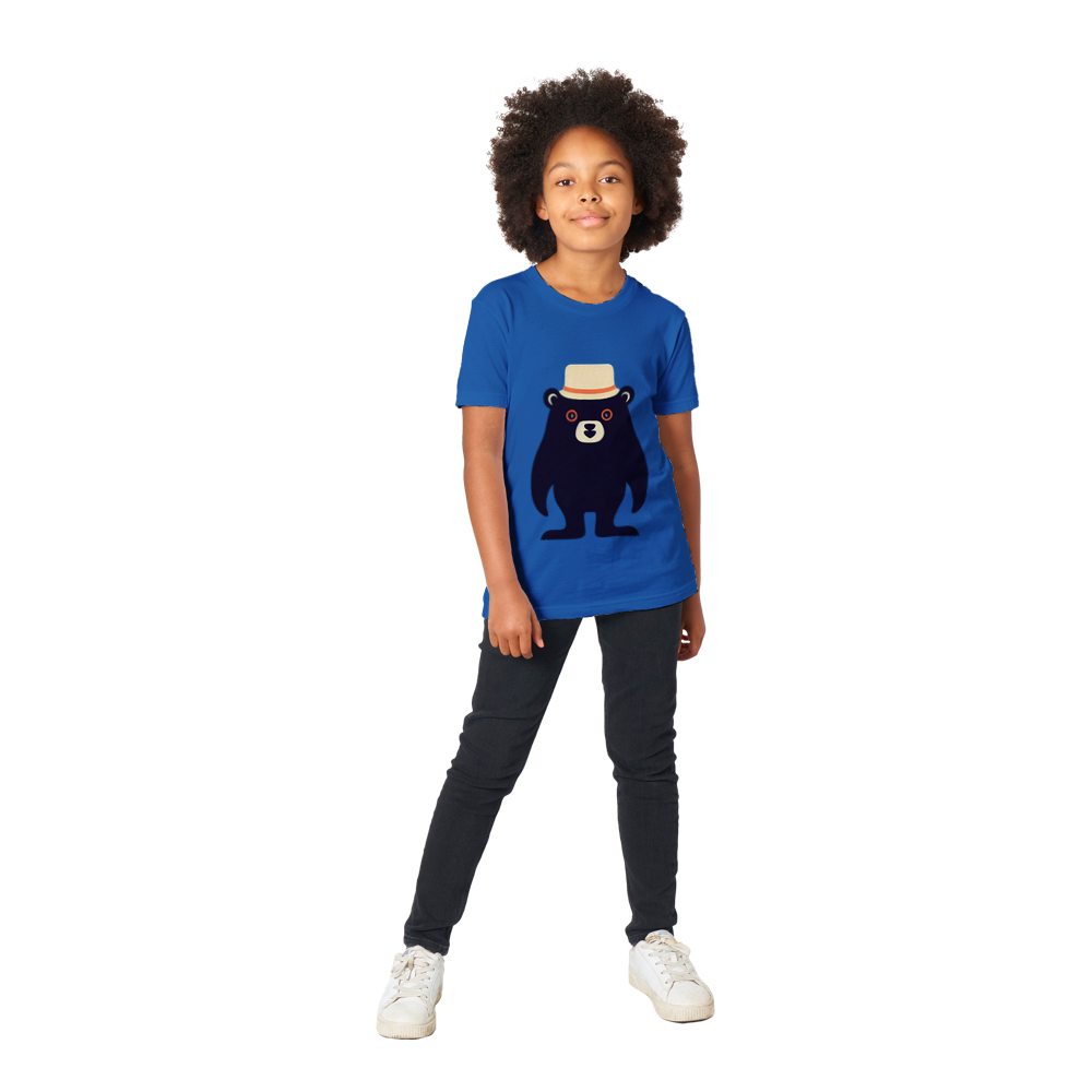 Kid wearing a royal blue t-shirt with a cute bear print