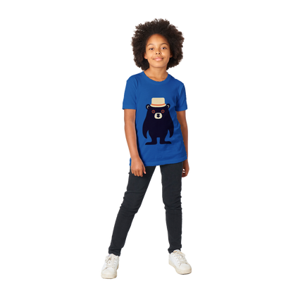 Kid wearing a royal blue t-shirt with a cute bear print
