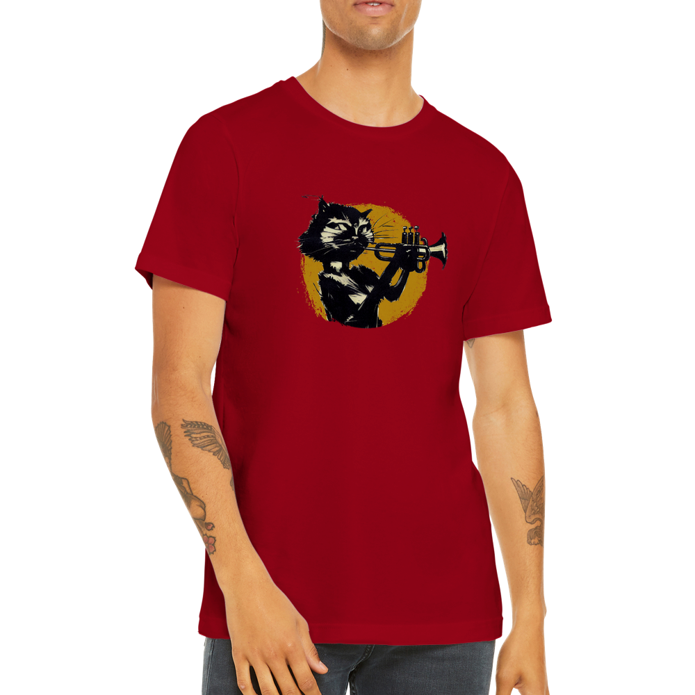 A guy wearing a red t-shirt with a cat playing the trumpet print