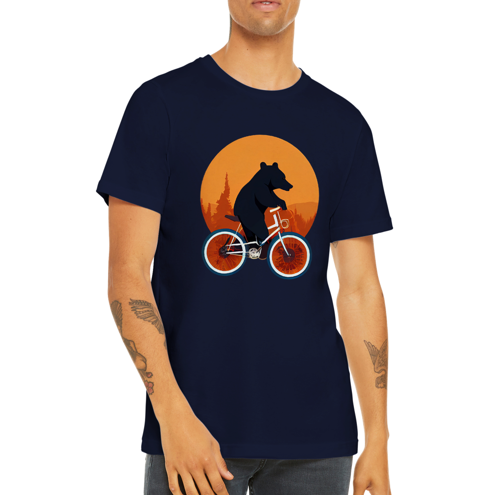A guy  wearing a navy t-shirt with a bear riding a bike print