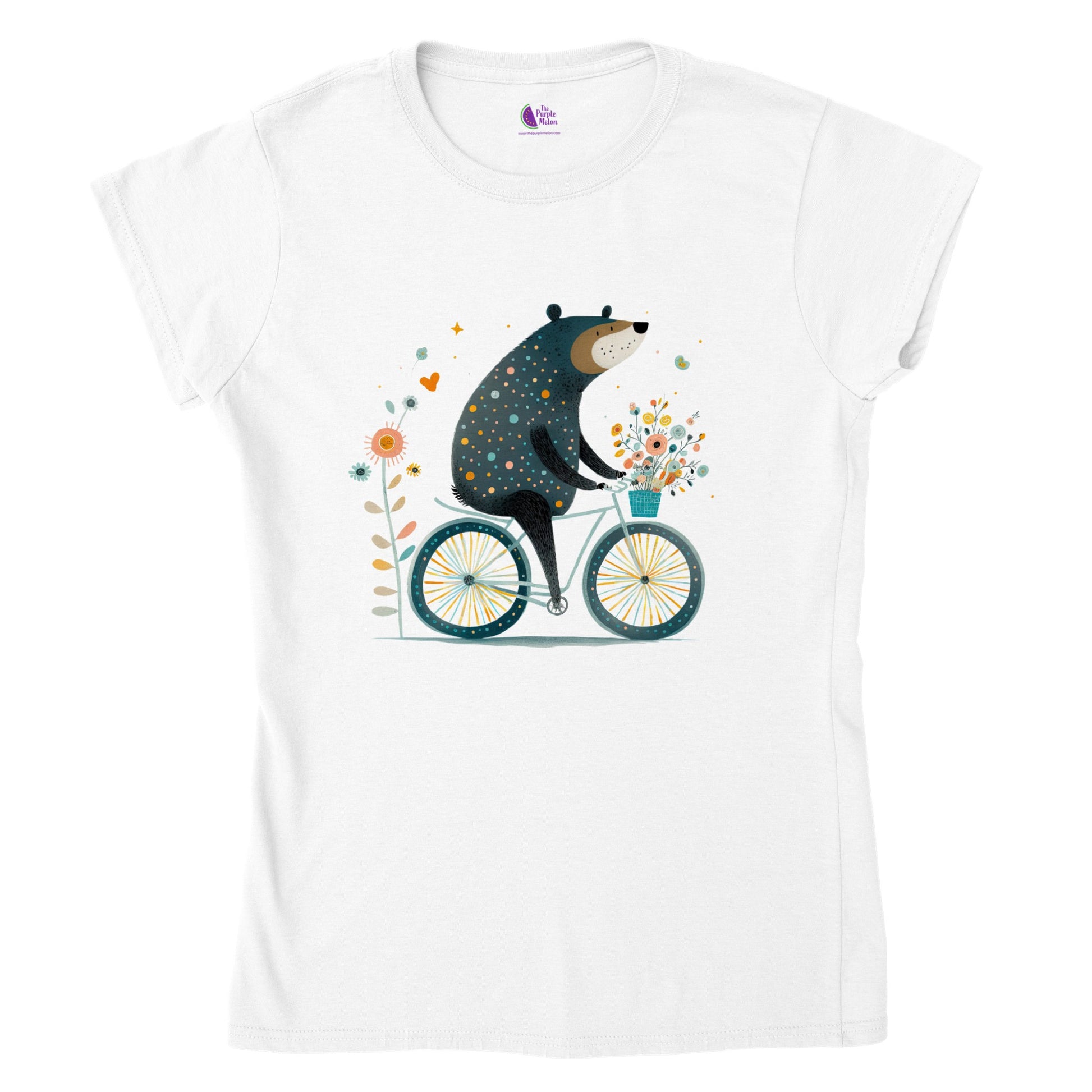 A white t-shirt with a cute bear riding a bicycle with a basket of flowers print