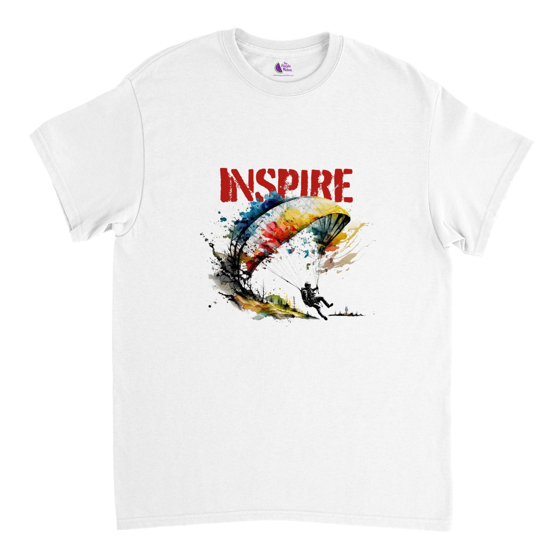 White t-shirt with a paraglider print and the caption inspire