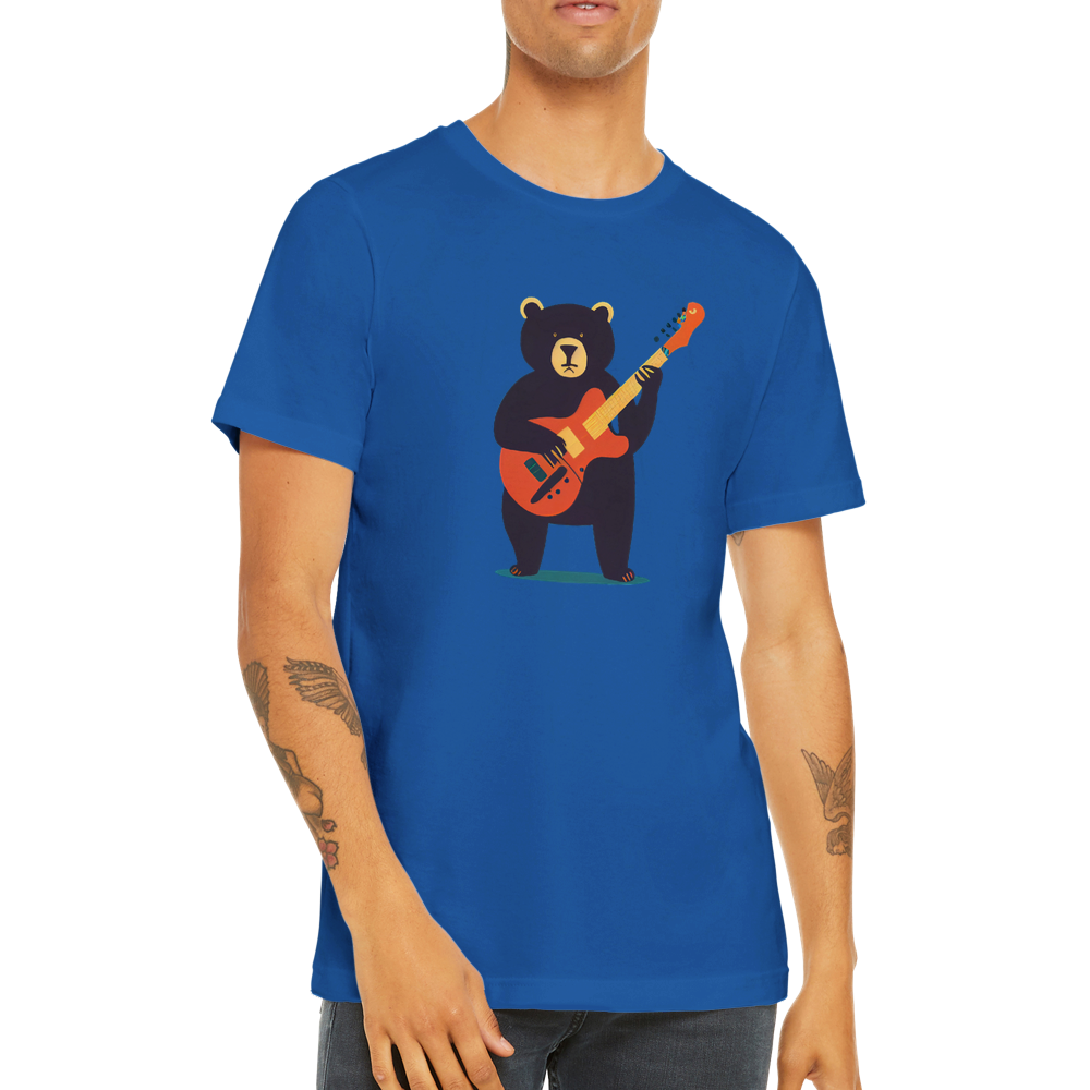 man waering a royal blue t-shirt with a bear playing a guitar print